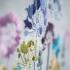 Chemin de table imprimé à broder en divers points de broderie motif Allium en bleu et violet de la marque Vervaco
